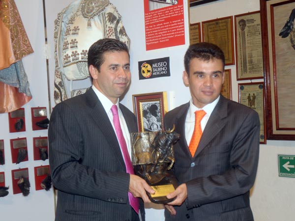 Con el premio