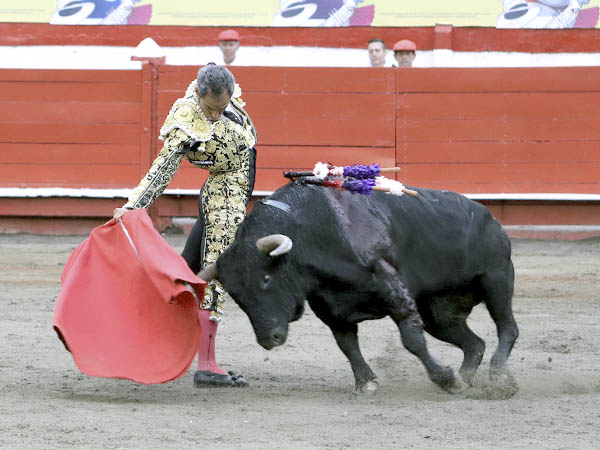 De costado